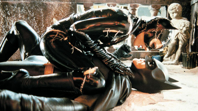 Batman Returns (1992) Directed by Tim Burton Shown: Michelle Pfeiffer (as Catwoman), Michael Keaton (as Batman)