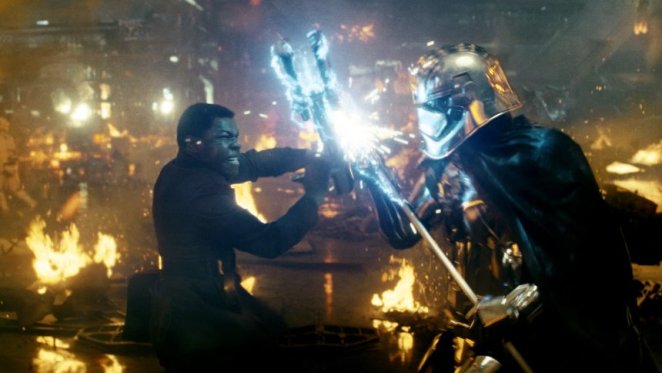 Star Wars: The Last Jedi..L to R: Finn (John Boyega) battling Captain Phasma (Gwendoline Christie)..Photo: Lucasfilm Ltd. ..Ā© 2017 Lucasfilm Ltd. All Rights Reserved.